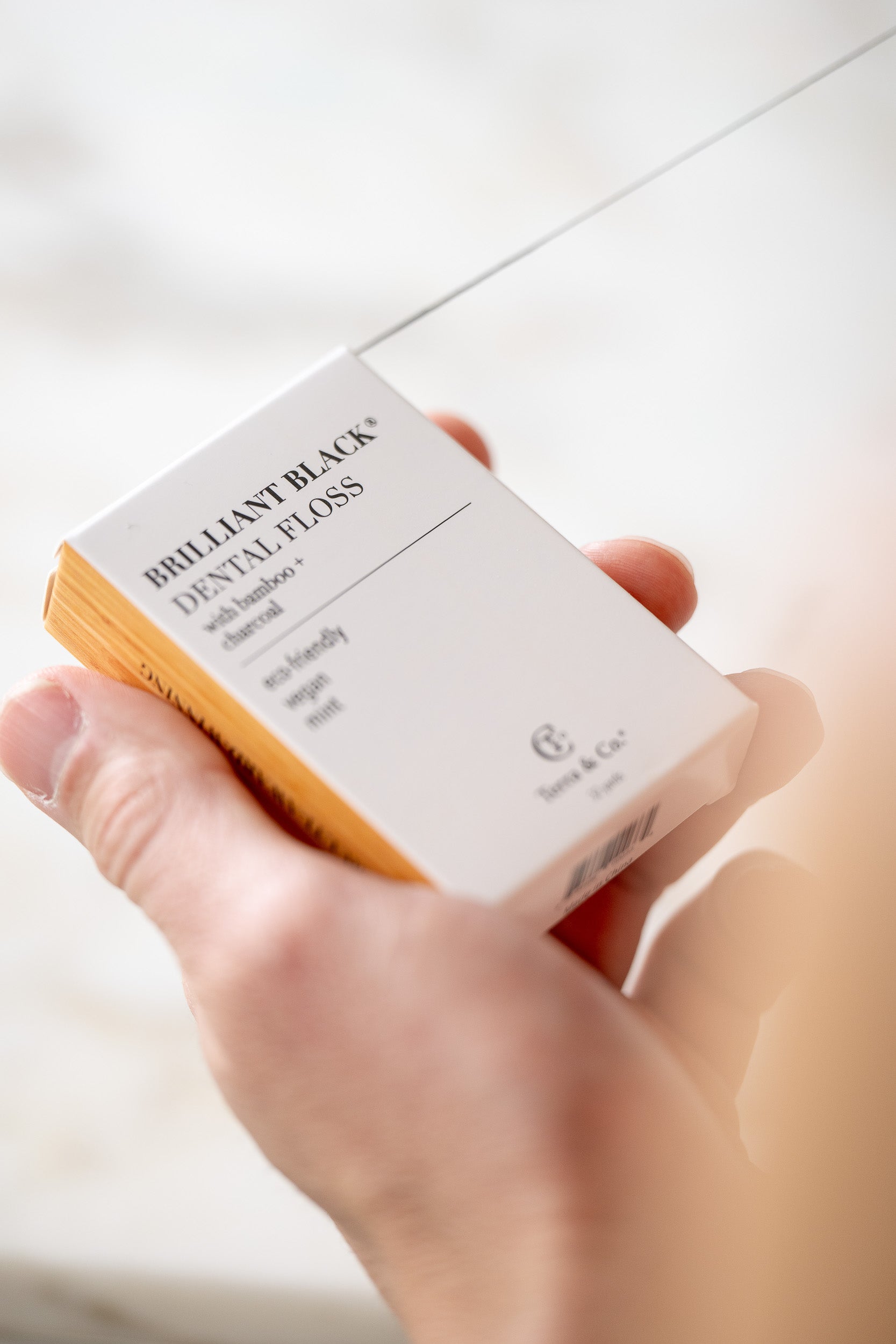 Brilliant Black® Floss – Whitens Between Teeth Naturally by Terra & Co.